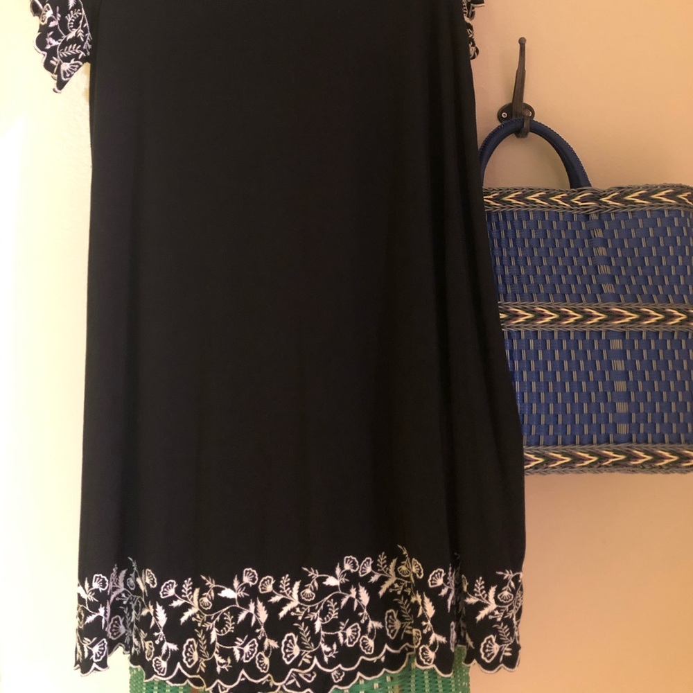 Black dress with beautiful embroidery.